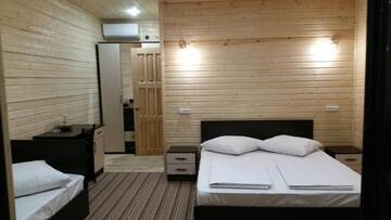 Фото номера Трехместный номер «Комфорт» с душем Гостевой дом Guest House Ahan г. Гагра 11