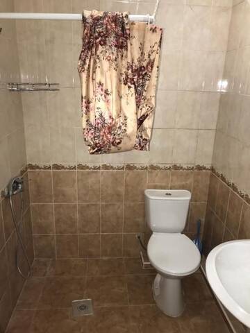 Фото номера Четырехместный номер с ванной комнатой Гостевой дом Guest House on Demerjipa г. Гагра 10