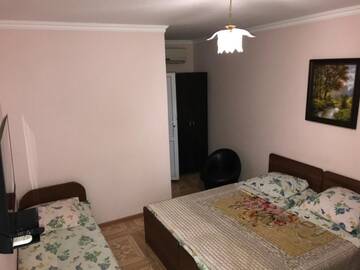 Фото номера Четырехместный номер с ванной комнатой Гостевой дом Guest House on Demerjipa г. Гагра 8