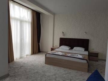 Фото номера Семейный полулюкс Гостевой дом Guest House on Ardzinba 91 г. Гагра 6