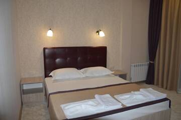 Фото номера Улучшенный двухместный номер с 1 кроватью Гостевой дом Guest House on Ardzinba 91 г. Гагра 3