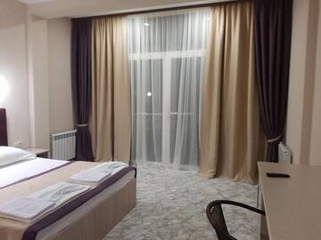 Фото номера Улучшенный двухместный номер с 1 кроватью Гостевой дом Guest House on Ardzinba 91 г. Гагра 7