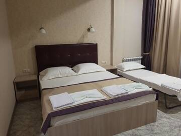 Фото номера Улучшенный двухместный номер с 1 кроватью Гостевой дом Guest House on Ardzinba 91 г. Гагра 8