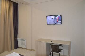 Фото номера Улучшенный двухместный номер с 1 кроватью Гостевой дом Guest House on Ardzinba 91 г. Гагра 11