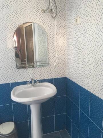 Фото номера Стандартный трехместный номер Гостевой дом Davido Hotel г. Гагра 17
