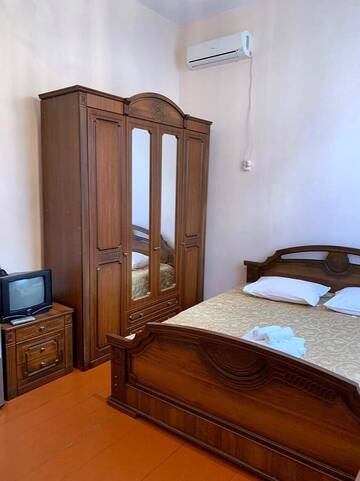 Фото номера Стандартный трехместный номер Гостевой дом Guest House Margarita г. Гагра 6