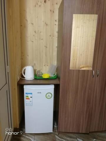 Фото номера Двухместный номер с двуспальной кроватью и дополнительной кроватью Гостевой дом Гостевой дом Орхидея г. Гагра 16