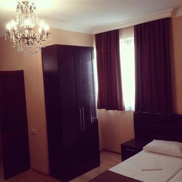 Фото номера Просторный двухместный номер с 2 отдельными кроватями Отель Hotel Sea г. Гагра 17