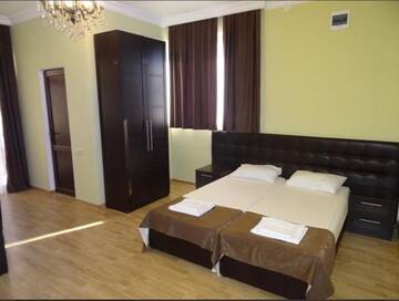 Фото номера Просторный двухместный номер с 2 отдельными кроватями Отель Hotel Sea г. Гагра 7