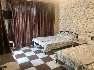 Фото номера Классический четырехместный номер Гостевой дом Guest house Четыре Сезона г. Гагра 6