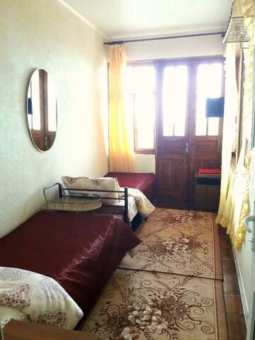 Фото номера Двухместный номер с 2 отдельными кроватями Гостевой дом Guest house ARIOZO - GAGRA &amp; R.A. г. Гагра 2