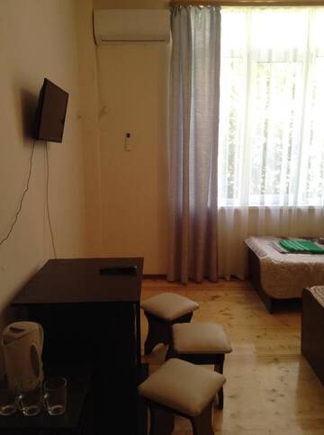 Фото номера Трехместный номер Гостевой дом Guest house Shtil г. Гагра 32