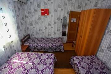 Фото номера Четырехместный номер эконом-класса Гостевой дом Гостевой дом Очаг г. Гагра 13