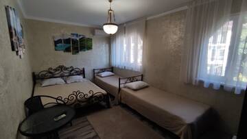 Фото номера Семейный номер Standard с видом на горы Гостевой дом Guest House Agava on Cherkesskaya 36 г. Гагра 4