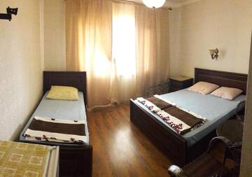 Фото номера Стандартный трехместный номер Гостевой дом Guest House Mihalych г. Гагра 4