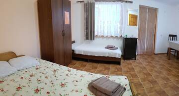 Фото номера Трехместный номер с собственной ванной комнатой Гостевой дом Guest house Nikolay г. Гагра 2