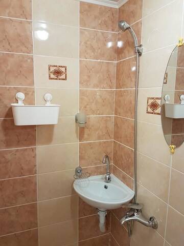 Фото номера Трехместный номер с собственной ванной комнатой Гостевой дом Guest house Nikolay г. Гагра 5