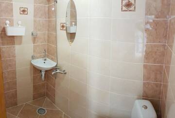 Фото номера Трехместный номер с собственной ванной комнатой Гостевой дом Guest house Nikolay г. Гагра 3
