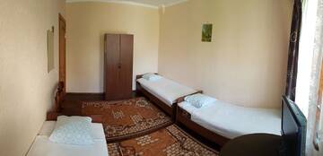 Фото номера Стандартный трехместный номер Гостевой дом Guest house Nikolay г. Гагра 5