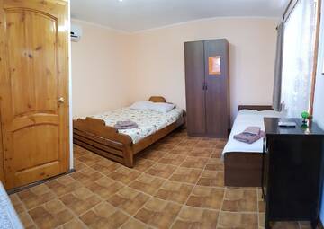 Фото номера Трехместный номер с собственной ванной комнатой Гостевой дом Guest house Nikolay г. Гагра 6