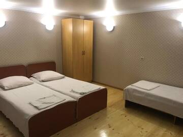 Фото номера Трехместный номер «Комфорт» с душем Гостевой дом Guest house Dali г. Гагра 2