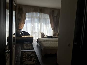 Фото номера Двухместный номер с 2 отдельными кроватями и дополнительной кроватью Отель Руслан г. Гагра 16