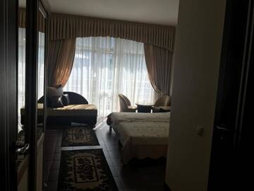 Фото номера Двухместный номер с 2 отдельными кроватями и дополнительной кроватью Отель Руслан г. Гагра 31
