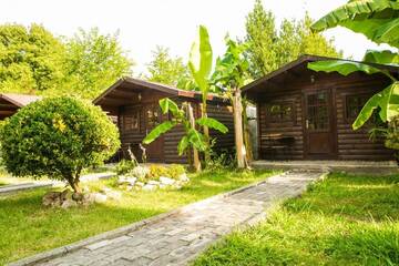 Фото номера Коттедж с 1 спальней Комплексы для отдыха с коттеджами/бунгало Cottages in Gagra г. Гагра 16