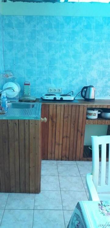 Фото номера Апартаменты с террасой Гостевой дом Guest House Sakura г. Гагра 10