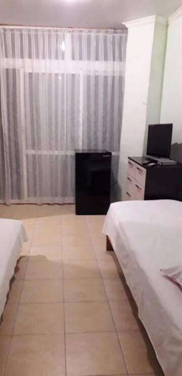 Фото номера Апартаменты с террасой Гостевой дом Guest House Sakura г. Гагра 4