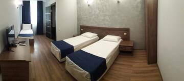 Фото номера Стандартный трехместный номер Гостевой дом Nobi Guest House г. Гагра 18