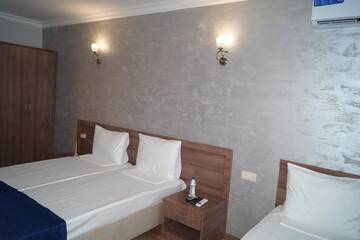 Фото номера Стандартный трехместный номер Гостевой дом Nobi Guest House г. Гагра 4