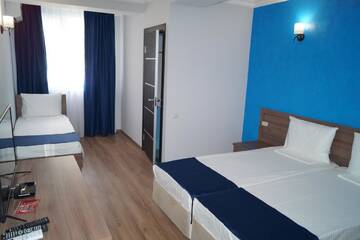Фото номера Стандартный трехместный номер Гостевой дом Nobi Guest House г. Гагра 8