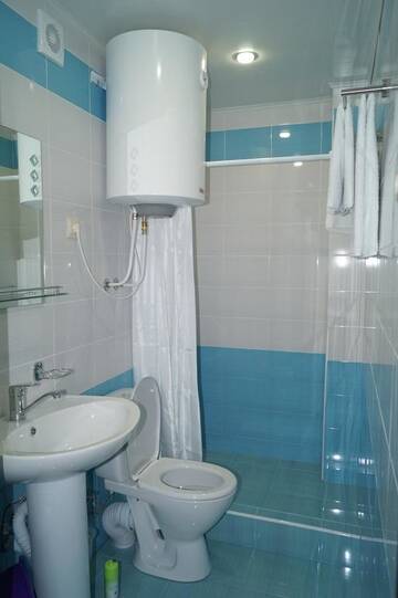 Фото номера Стандартный трехместный номер Гостевой дом Nobi Guest House г. Гагра 7