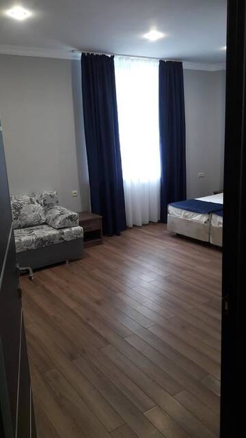Фото номера Четырехместный номер с видом на горы Гостевой дом Nobi Guest House г. Гагра 12