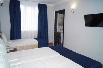Фото номера Стандартный трехместный номер Гостевой дом Nobi Guest House г. Гагра 33