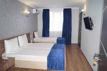 Фото номера Стандартный трехместный номер Гостевой дом Nobi Guest House г. Гагра 3