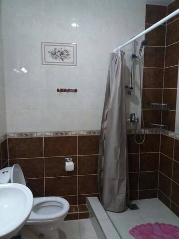 Фото номера Двухместный номер с 2 отдельными кроватями и душем Гостевой дом Guest House Polet Chayki г. Гагра 2