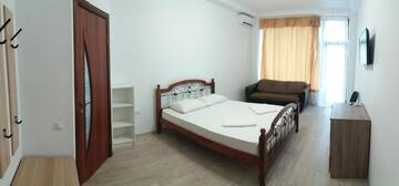 Фото номера Четырехместный номер с балконом Гостевой дом Guest House Polet Chayki г. Гагра 6