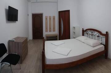 Фото номера Четырехместный номер с балконом Гостевой дом Guest House Polet Chayki г. Гагра 3