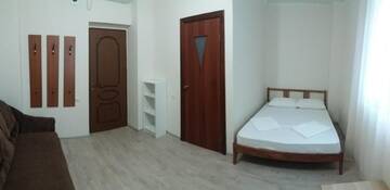 Фото номера Четырехместный номер с видом на горы Гостевой дом Guest House Polet Chayki г. Гагра 3