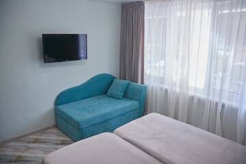 Фото номера Улучшенный трехместный номер Мини-отель Gnezdo Beloy Sovy Mini Hotel г. Гагра 5