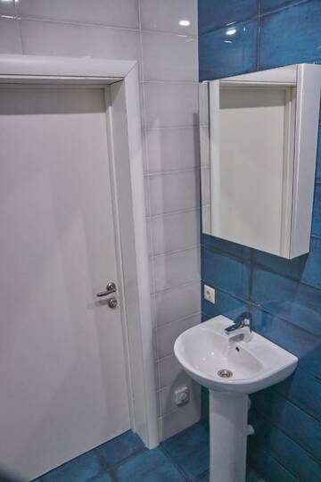 Фото номера Двухместный номер с 2 отдельными кроватями и душем Мини-отель Gnezdo Beloy Sovy Mini Hotel г. Гагра 3