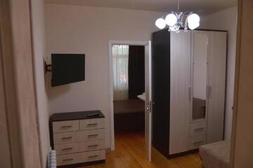 Фото номера Семейный люкс с балконом Мини-отель Gnezdo Beloy Sovy Mini Hotel г. Гагра 6