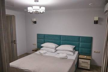 Фото номера Роскошный четырехместный номер Мини-отель Gnezdo Beloy Sovy Mini Hotel г. Гагра 4