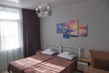 Фото номера Стандартный трехместный номер Мини-отель Gnezdo Beloy Sovy Mini Hotel г. Гагра 5
