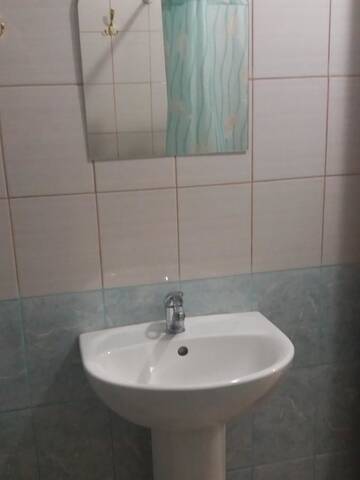 Фото номера Улучшенные апартаменты Дома для отпуска Aurelia Guest House г. Гагра 4