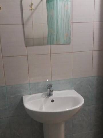 Фото номера Улучшенные апартаменты Дома для отпуска Aurelia Guest House г. Гагра 15