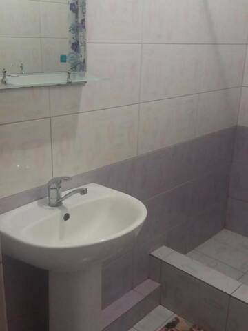 Фото номера Улучшенные апартаменты Дома для отпуска Aurelia Guest House г. Гагра 19