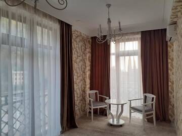 Фото номера Люкс с кроватью размера «king-size» и балконом Отель RIT Hotel г. Гагра 23